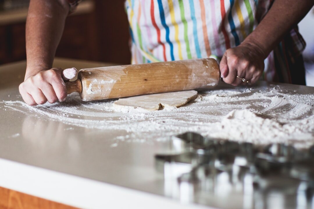woman kneading dough in kitchen